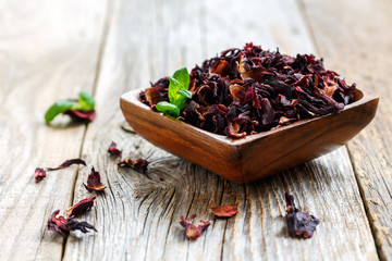 Bowl with petals of hibiscus tea