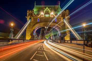 Tower Bridge, London at night with moving traffic. - 134357282