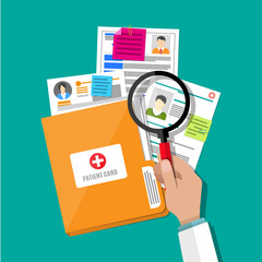 Folder and patient card, hand magnifying glass