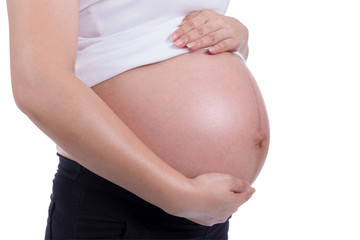 Pregnant woman holding hand.