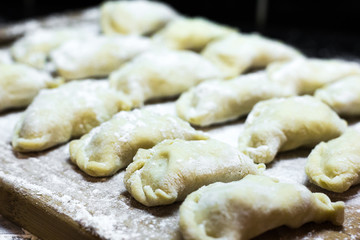 Fototapeta na wymiar Traditional dumplings in the old New Year