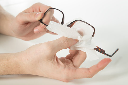 Boy Cleaning Glasses