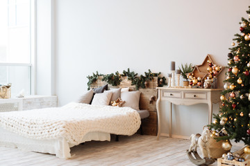white bedroom with Christmas decorations