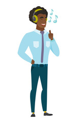 Businessman listening to music in headphones.