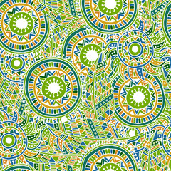 Ethnic seamless pattern with feathers and circles.