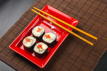 still life - set the rolls on a red plate