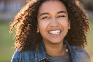 Mixed Race African American Girl Teenager With Perfect Teeth - obrazy, fototapety, plakaty