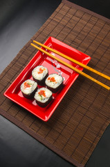 still life - set the rolls on a red plate