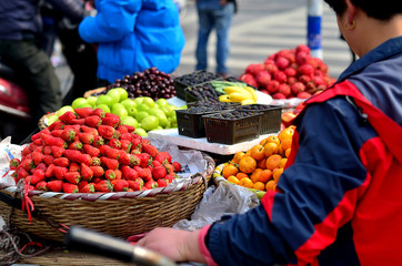 A street vendor selling fruits