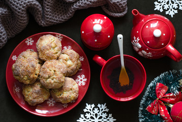 Fototapeta na wymiar Cottage cheese cookies with apple and tea on Christmas