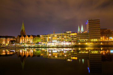 Cityscape of night Bremen, Germany over the Rhein river
