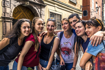 Group of young people are walking around the Stockholm, Sweden - obrazy, fototapety, plakaty