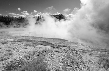 Excelsior Geyser in the Midway Geyser Basin next to the Firehole River in Yellowstone National Park...