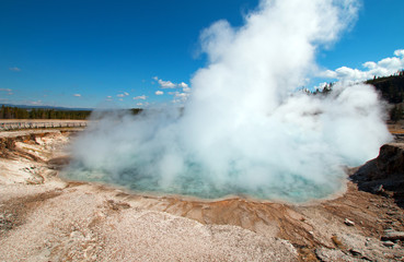 Excelsior Geyser in the Midway Geyser Basin next to the Firehole River in Yellowstone National Park in Wyoming USA