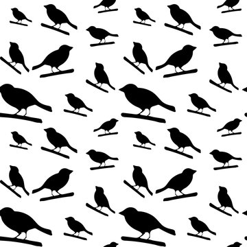 Pattern with black silhouettes of birds.