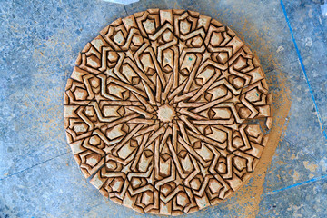 Making of Moroccan mosaic in a factory placing the tiles upside