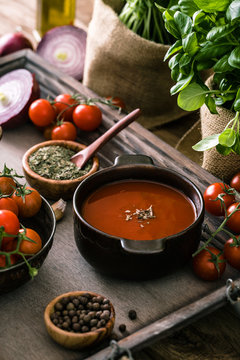 Tomato soup on wood