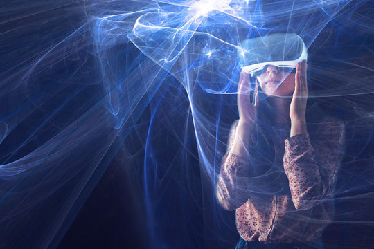 Fototapeta Woman with glasses of virtual reality. Future technology concept.