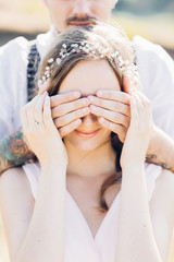 bride and groom hugging at the wedding in nature.