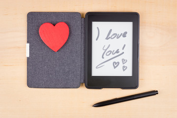 E-book reader with red heart and inscription "I love You"