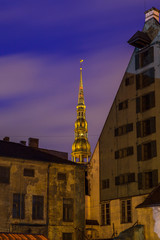 Fototapeta premium St. Peter church tower at deep night. Riga, Latvia