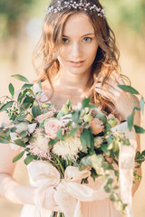 bride with bouquet of flowers