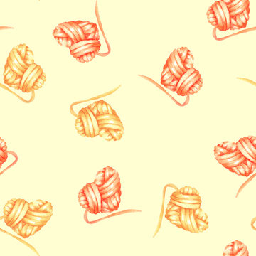 Seamless pattern with watercolor yellow and red heart ball of yarn; hand drawn on a tender background