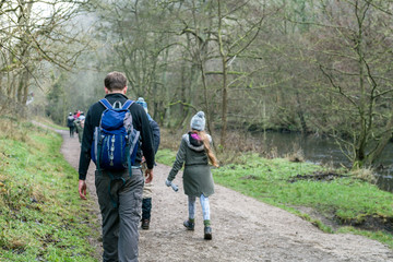 Fototapeta na wymiar Male and Female hikers walking along the trails near Thorpe Clou