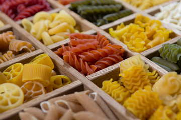 Obraz na płótnie Canvas Variety of types, colors and shapes of Italian pasta. Dry pasta