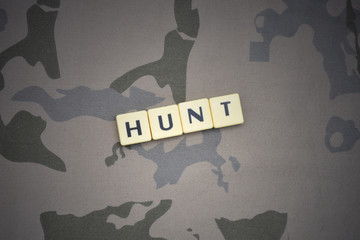 letters with text hunt on the khaki background