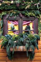 Fototapeta na wymiar Window decorated in Christmas style. Celebration concept.