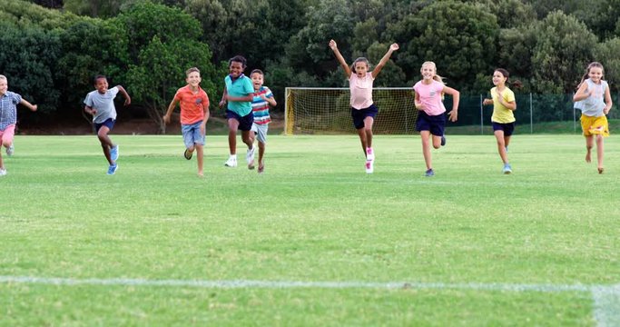 Slow Motion Of School Kids Running And Having Fun In Playground 4k