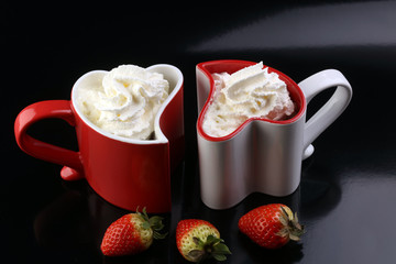 Valentine's day concept with hearts and cups. Coffee or hot choc