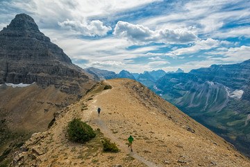 Trail runners on high mountain pass in Montana