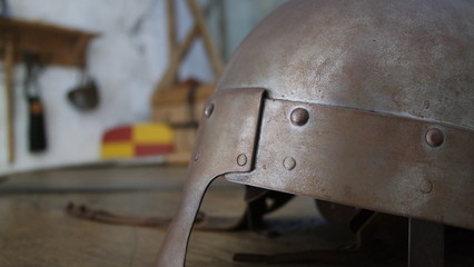 Medieval helm and weapons