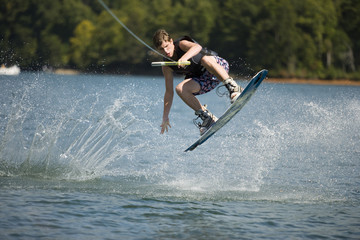 Young man wakeboarding