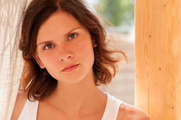 Close up portrait of teen brunette under baldachin © Vitya