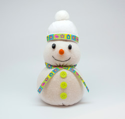 Photo of snowman isolated on neutral background