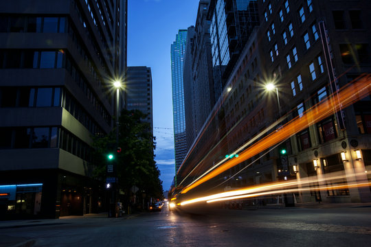 City street light trails at night.