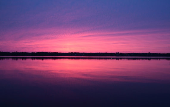 Dramatic sunset at Volga river © Supercharger