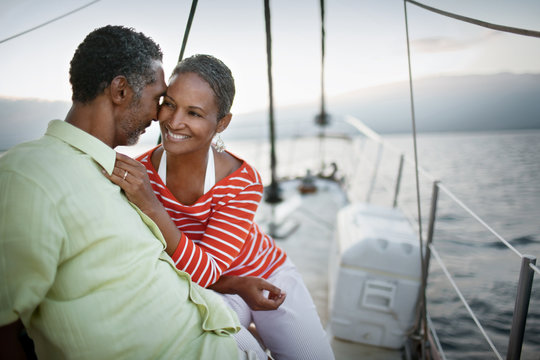 Mature couple on a sailboat