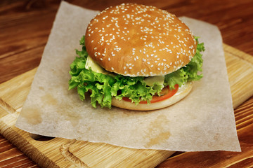 yummy burger. serving cheeseburger or hamburger with salad and t