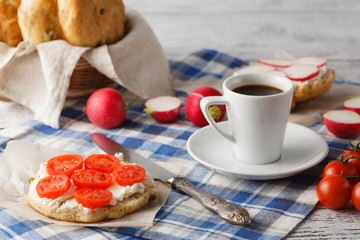 Sandwich with tomato and cheese. Breakfast with coffee concept