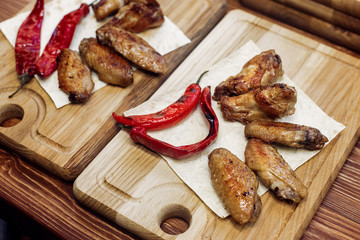 juicy chicken grilled steak with red pepper. serving on wooden d