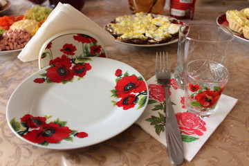 empty set for food, with painted red flowers