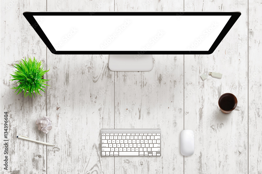 Aufkleber Office desk with white wooden texture in background. Computer display with isolated screen for mockup. Top view. Coffee, keyboard, mouse, plant, paper beside. Free space for hero heeader image tex.
