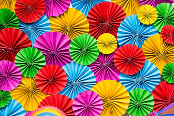 Fototapeta na wymiar Colorful paper flowers background.