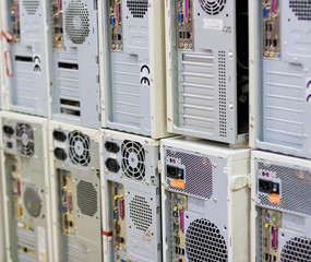 Rows of backplanes of standard computer cases with various slots