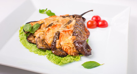eggplant baked with cheese on white background