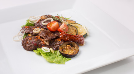 Baked meat with zucchini and eggplant